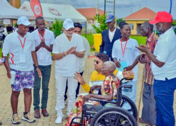 Centenarian Blesses Sudhir Ruparelia After Wheelchair Donation at RR Eye Camp Bukedea