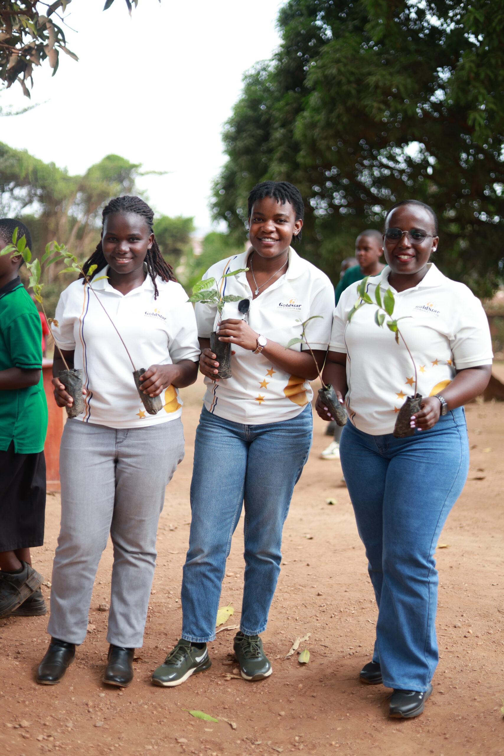 GoldStar Insurance marks 30 years with tree planting drive at Kira Primary School
